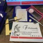 Il Kit del corso di trucco formato da dispense e cosmetici